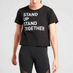 ATHLETA BLACK STAND UP GRAPHIC SHORT SLEEVE ORGANIC DAILY CROP TEE TOP